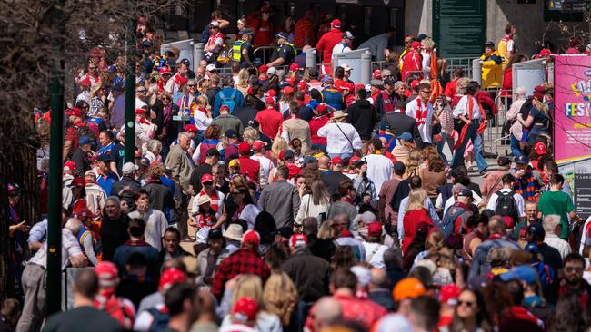 MELBOURNE, AUSTRALIA - NewsWire Photos - 28 September, 2024 AFL GRAND FINAL  Pictured Fans and crowds arrive for the final Sydney Swans vs Brisbane LionsPicture: NewsWire/Nadir Kinani