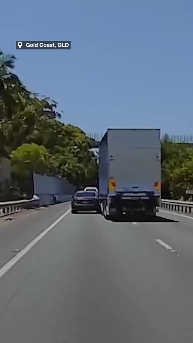 Dashcam captures dramatic moment semi-truck merges into car