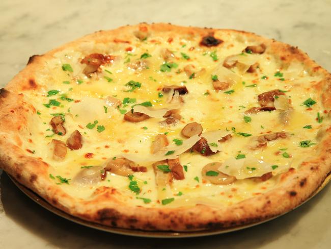 The Tartufo pizza, mozzarella, porcini mushrooms, truffle oil and parmigiana from Maybe Frank. Picture: Toby Zerna