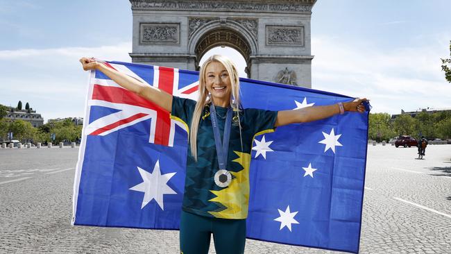 Olympic silver medallist Jess Hull poses for photos at the Arc de Triomphe. Photo: Michael Klein