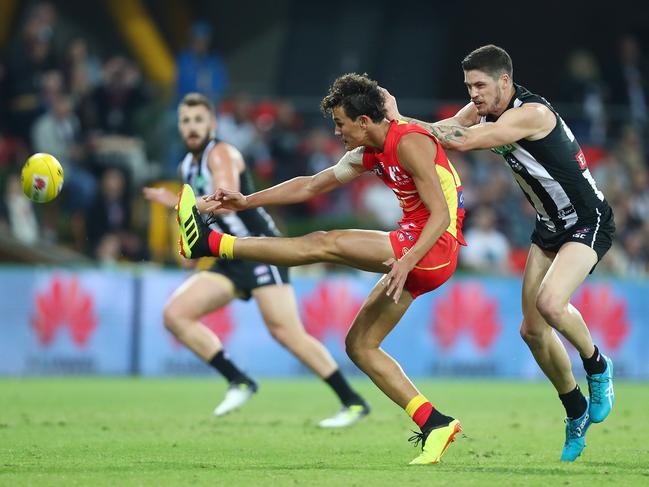 Wil Powell of the Suns kicks his first goal during the round 15 AFL match between the Gold Coast Suns and the Collingwood Magpies at Metricon Stadium on June 30, 2018 in Gold Coast, Australia. Picture: Chris Hyde, Getty Images.