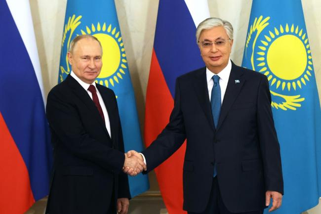 Vladimir Putin (L) visited Kazakhstan on Thursday to cement Russia's ties with its old ally