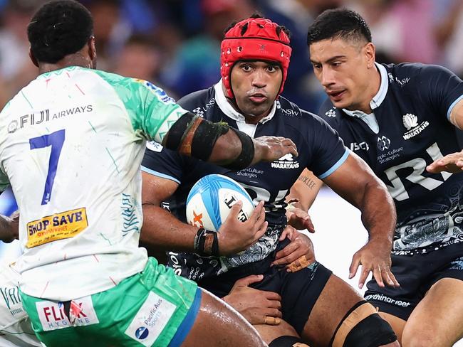 SYDNEY, AUSTRALIA - FEBRUARY 28: Langi Gleeson of the NSW Waratahs is tackled during the round three Super Rugby Pacific match between NSW Waratahs and Fijian Drua at Allianz Stadium, on February 28, 2025, in Sydney, Australia. (Photo by Cameron Spencer/Getty Images)