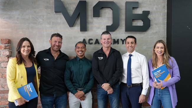 LNP Gaven candidate Bianca Stone, Men of Business Academy founder and CEO Marco Renai, graduate Haami, Men of Business Academy CEO Jason Sessarago, LNP leader David Crisafulli and Shadow Youth Justice Minister Laura Gerber at the Men of Business Academy premises in Southport.