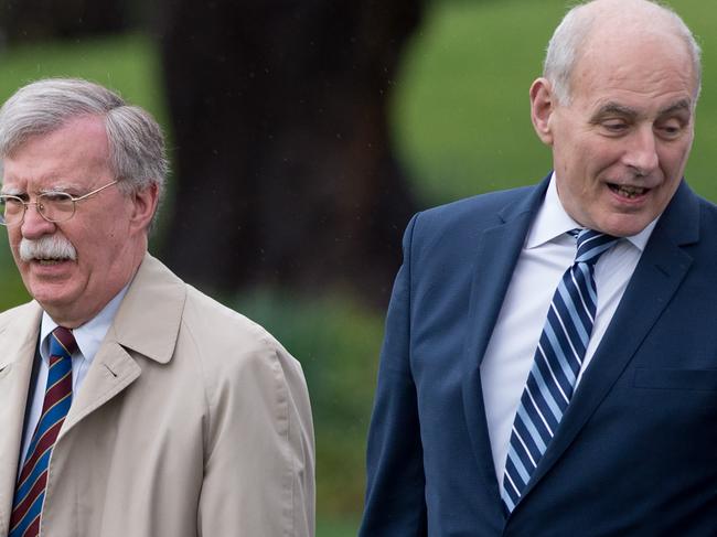 Donald Trump’s former chief of staff John Kelly, right, says he believes John Bolton over the US President. Picture: AFP