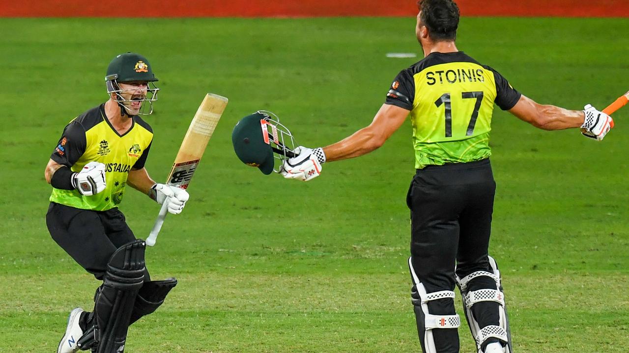 Australia's Matthew Wade and Marcus Stoinis celebrate their victory. Picture: AFP