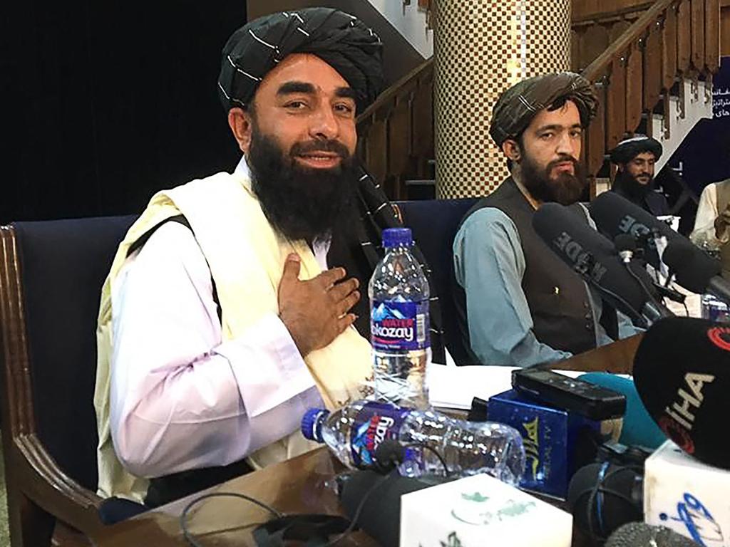 Taliban spokesman Zabihullah Mujahid is seen in public for the first time in 20 years. Picture: AFP