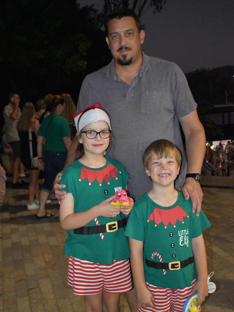 Warick, Emily and Flynn Thompson at the CBD Christmas Fair in Rockhampton on December 3, 2022.