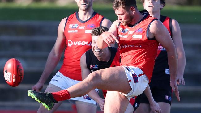 Norwood’s Mitch Grigg snaps for goal against West Adelaide. Picture: SARAH REED.