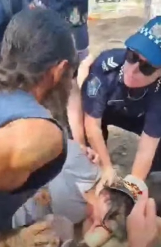 Police take action against protesters at the "Gympie Pyramid" site on October 30, 2021.