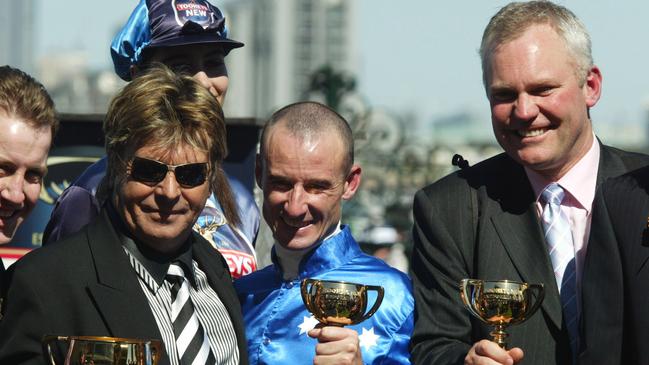 Tony Santic, Glen Boss and trainer David Hall celebrate their first of three. Picture: Julian Smith