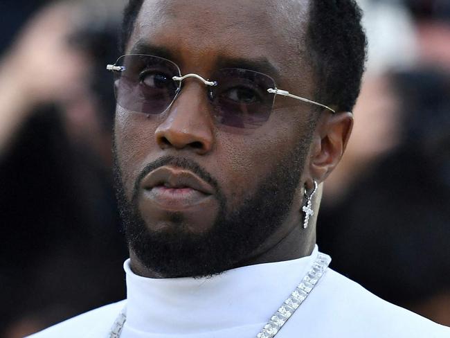 (FILES) Sean Combs arrives for the 2018 Met Gala on May 7, 2018, at the Metropolitan Museum of Art in New York. Music mogul Sean Combs is set to go on trial for racketeering and sex trafficking on May 5, 2025, a judge said in a court hearing October 10, 2024. The rapper known as "Diddy" will remain incarcerated, said federal judge Arun Subramanian, after he was indicted last month on three criminal counts that allege he sexually abused women and coerced them into drug-fueled sex parties using threats and violence. (Photo by Angela WEISS / AFP)