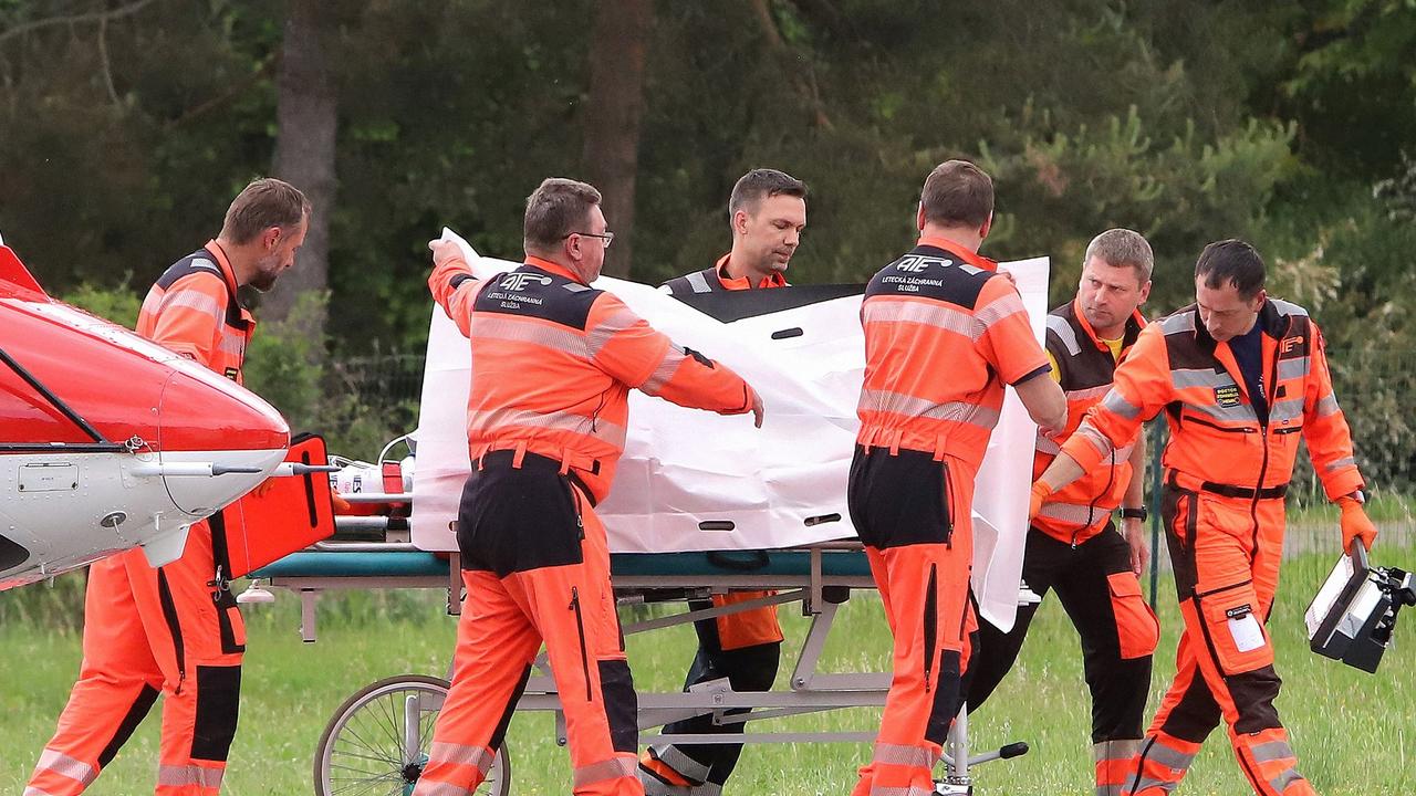 Prime Minister Robert Mr Fico being transported from a helicopter by medics to the hospital in Banska Bystrica, Slovakia. Picture: AFP