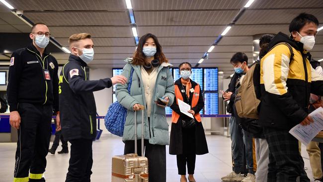 Travellers from China will have to produce a negative Covid test within 48 hours of travelling to Australia from Thursday. Picture: JULIENNE DE ROSA / AFP