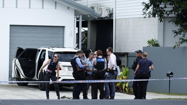 Police officers respond to reports of a shooting on Collins Ave, Edge Hill, by setting up a 500 metre exclusion zone. Edge Hill State School, a nearby kindergarten and swim school placed into lockdown. A black Audi TT coupe involved in the initial incident was later found abandoned outside a Pease Street address. Picture: Brendan Radke