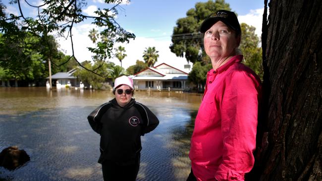 Narelle Shaw and daughter Isabel saw their Forbes home hit by the second flood in two weeks. Picture: Dean Marzolla