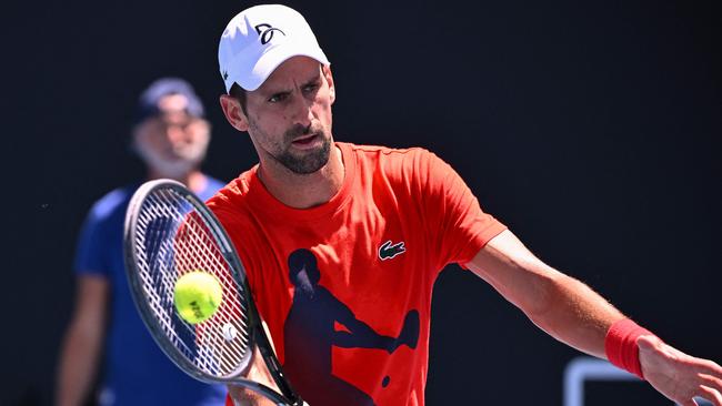 Novak Djokovic hits a shot during a practice session on day three of the Australian Open Picture: AFP