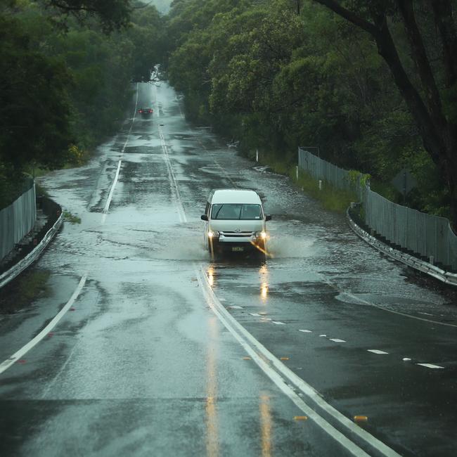 Flooding on Wakehurst Parkway in April this year forced police to close the road. Picture John Grainger