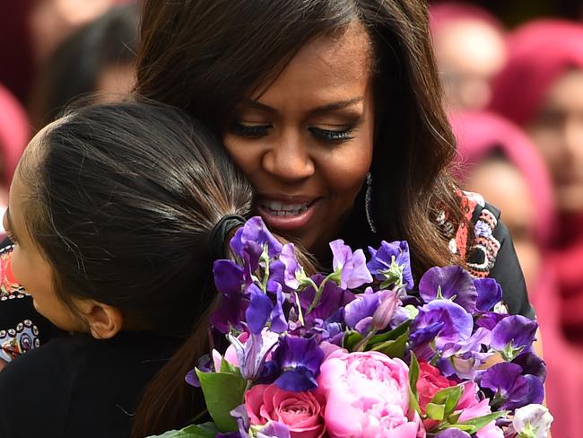 The famous Obama hug comes out. Picture: Jeff J Mitchell / Getty Images.
