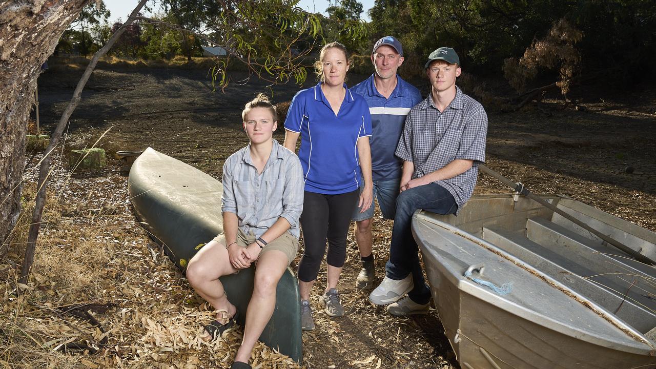 The ongoing dry spell has left their creek empty and rainwater tanks dry. Picture: Matt Loxton