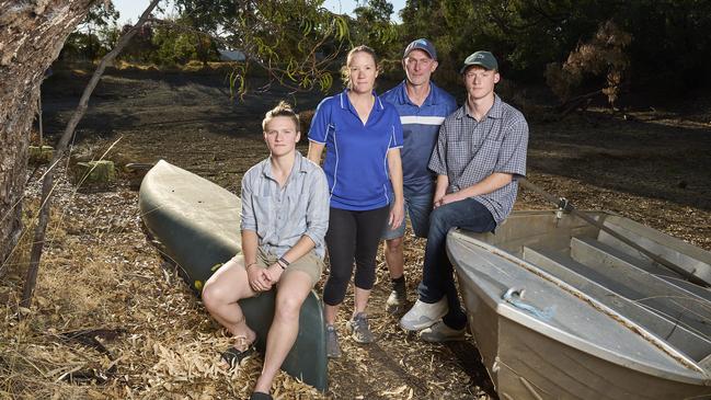 The ongoing dry spell has left their creek empty and rainwater tanks dry. Picture: Matt Loxton