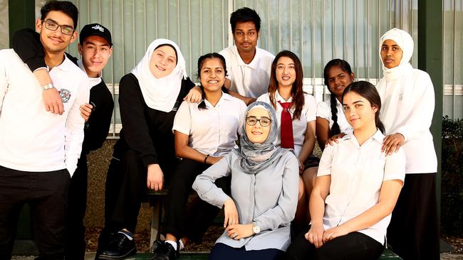 Holroyd high school teacher Nila Sayeed appeared in a video by the Department of Education, with some of her students, about her journey from being a refugee to a science teacher. Picture: Justin Sanson