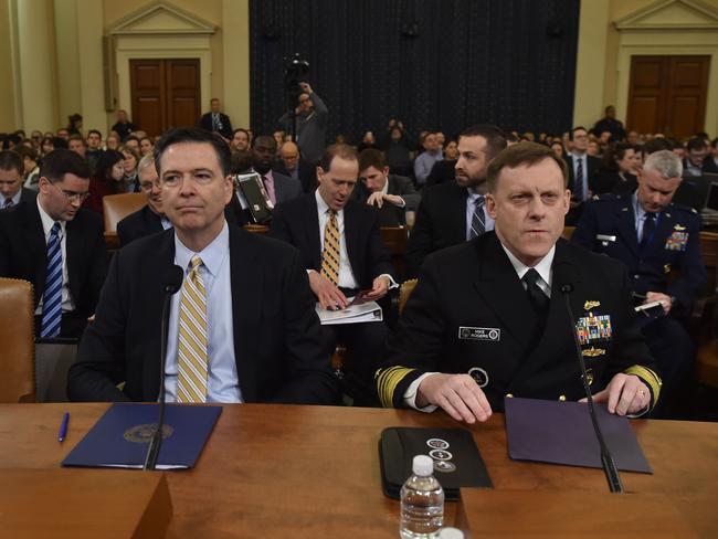 FBI Director James Comey (left) and National Security Agency Director Mike Rogers (right) testify on Capitol Hill in Washington DC. Picture: AFP/Nicholas Kamm