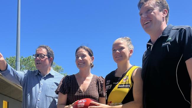 Solomon MP Luke Gosling, AFL NT Facilities and Government Partnerships Manager NT Katrina Kawaljenko, Nightcliff Tigers player Hayley Jones and Councillor Ed Smelt at Nightcliff Oval.