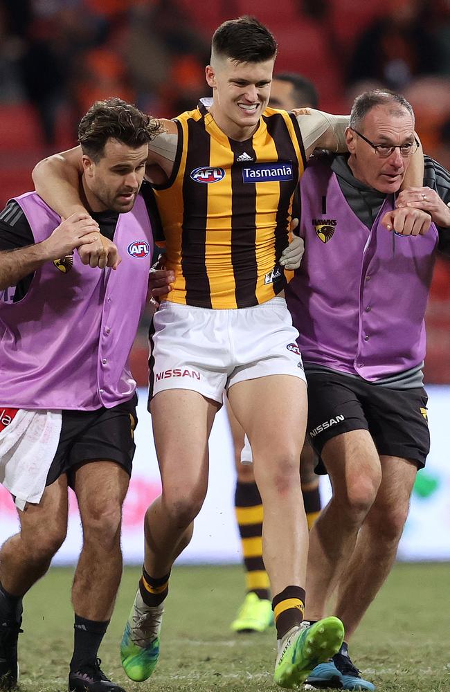 Forward Mitchell Lewis left the field in the hands of trainers. Picture: Phil Hillyard