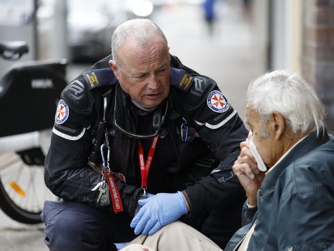 Intensive care paramedic Paul Smith on scene with an elderly man in Bondi. Picture: Richard Dobson