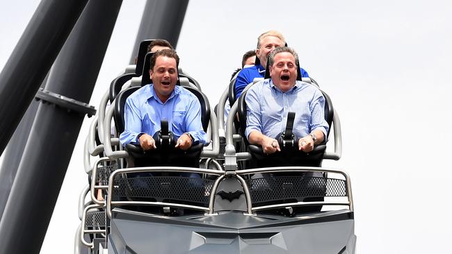 Queensland Opposition Leader Tim Nicholls (right) and the Member for Theodor Mark Buthman take a ride on the DC Rivals Hypercoaster at the Movie World theme park on the Gold Coast. Picture: AAP Image/Dan Peled.