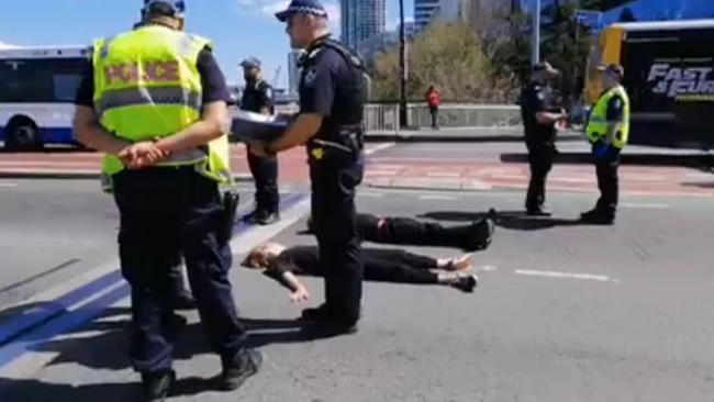 Two Extinction Rebellion protesters have been arrested after shutting down part of Victoria Bridge in Brisbane's CBD. Picture: Facebook