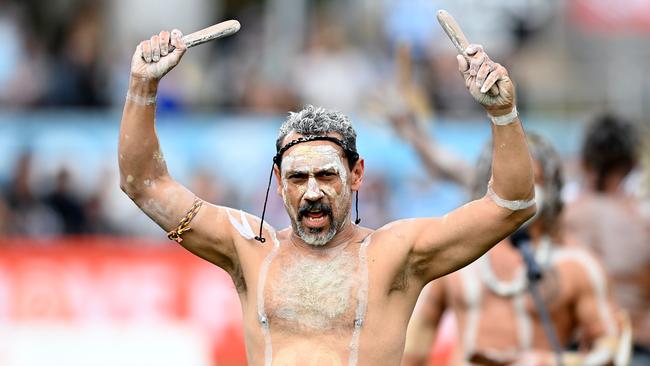 Wajaar Ngaarlu dance troupe member Christian Lugnan performs at the NRL Indigenous round match between the Gold Coast Titans and Cronulla Sharks. (Photo by Bradley Kanaris/Getty Images)