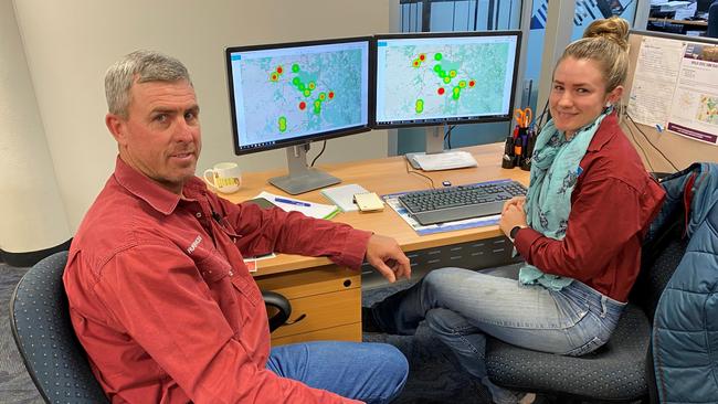 Rural services team members inspecting pest hotspot data. Photo/Western Downs Regional Council