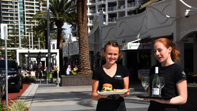 The Coffee Club’s Chloe Stephens and Freyja Hagen are excited to see Broadbeach’s Surf Parade reopened. Photo: Steve Holland