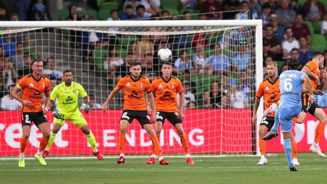 Melbourne City’s Josh Brillante fires in a volley that hit the post and then rebounded into the net off the back of Brisbane keeper Jamie Young. Picture: AAP