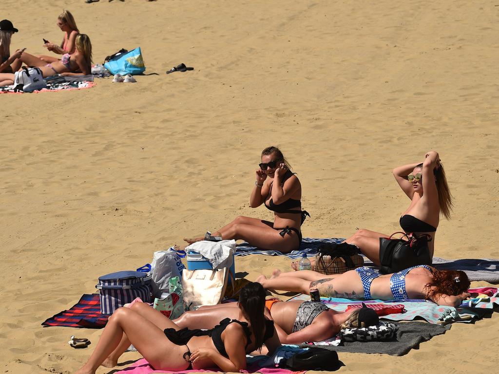 Warm spring weather sparked fears of social distancing at beaches and around the country. Picture: Glyn KIRK / AFP.