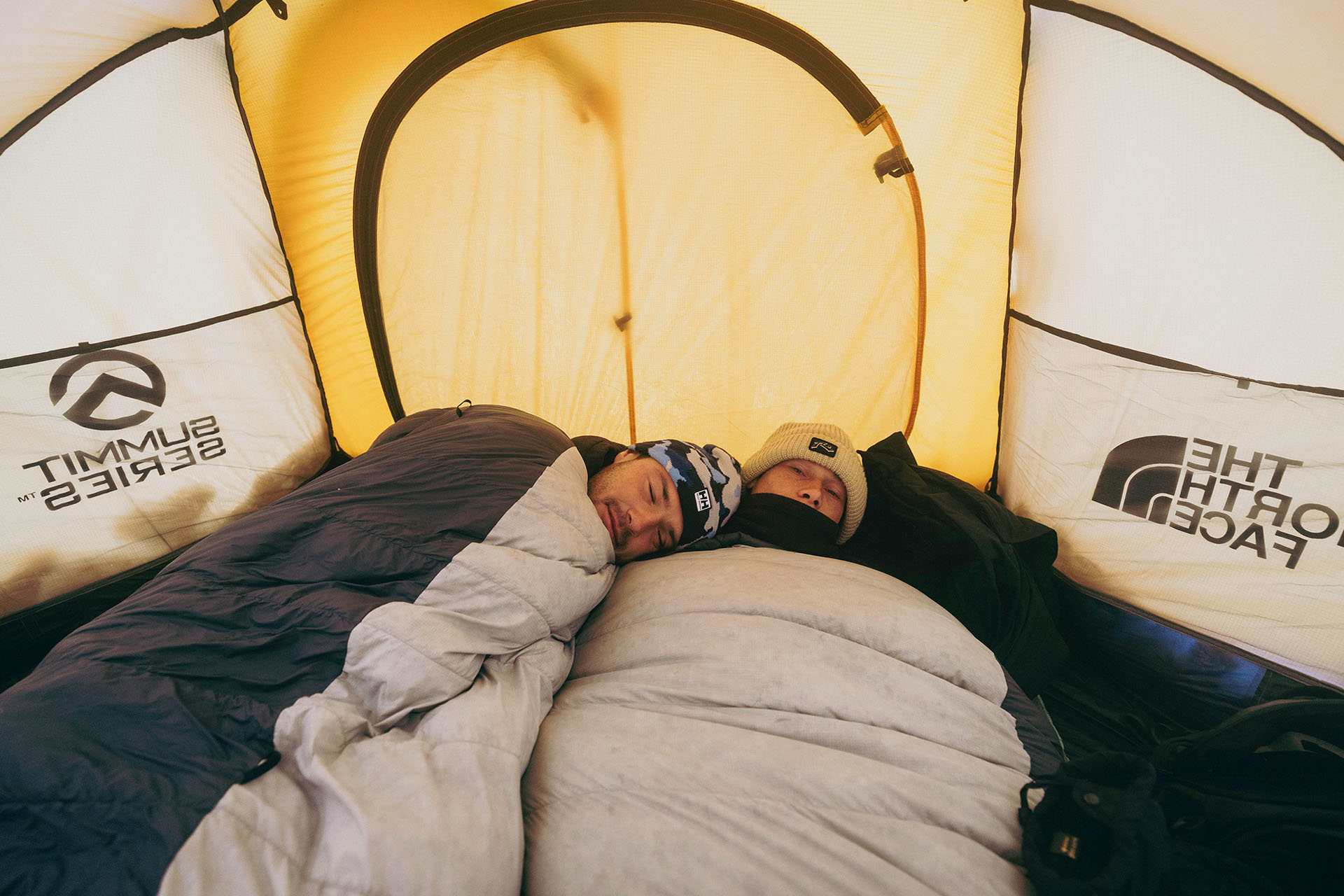 <p><em>Dovell (left) and Mortensen snuggle during a camping trip. Image credit: Guy Williment</em></p>