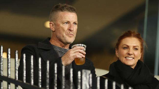 Former Richmond coach Damien Hardwick enjoys a beer before the round 14 AFL match between Richmond and St Kilda at the Melbourne Cricket Ground on June 17, 2023, in Melbourne Photo by Michael Klein.