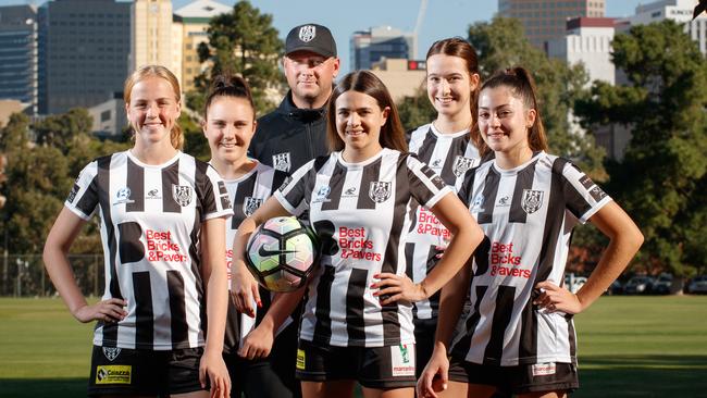 Adelaide City players Emily Gale, left, Grace Abbey, Daniela DiBartolo, coach Andrew Calderbank, Mikayla Vidmar and Chrissie Zikos. Picture: Matt Turner