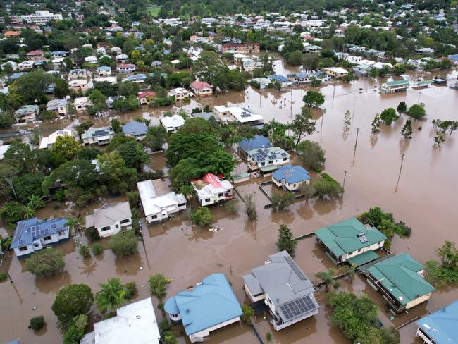 LISMORE, AUSTRALIA – MARCH 31: An aerial drone view of houses surrounded by floodwater on March 31, 2022 in Lismore, Australia. Evacuation orders have been issued for towns across the NSW Northern Rivers region, with flash flooding expected as heavy rainfall continues. It is the second major flood event for the region this month. (Photo by Dan Peled/Getty Images)