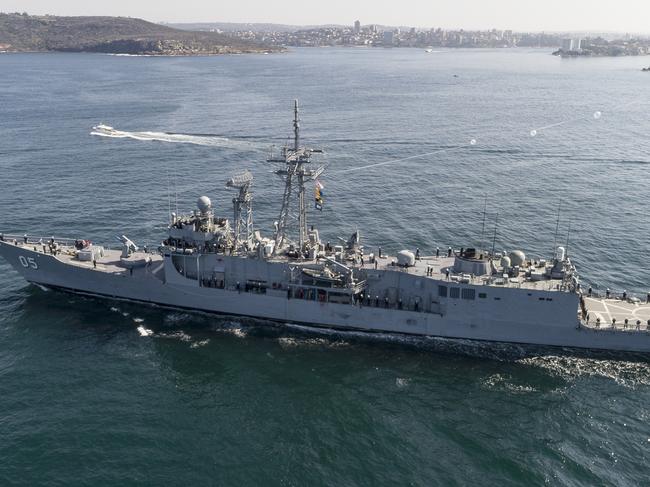 HMAS Melbourne, the last of her class, enters the harbour city and her home port of Sydney for the last time as a commissioned warship of the Royal Australian Navy Flotilla. *** Local Caption *** HMAS Melbourne sailed into her home port for the final time. The 138-metre long Guided Missile Frigate arrived at Fleet Base East bringing her 27 years of service at sea to an end.  HMAS Melbourne was commissioned in 1992 and has sailed more than 780,000 nautical miles throughout her service life. She deployed to the Middle East eight times and earned battle honours for her service in East Timor, the Persian Gulf and the Middle East. She recently completed a four month deployment through Asia, including conducting international maritime surveillance operations to enforce sanctions against North Korea.  HMAS Melbourne will decommission in October.