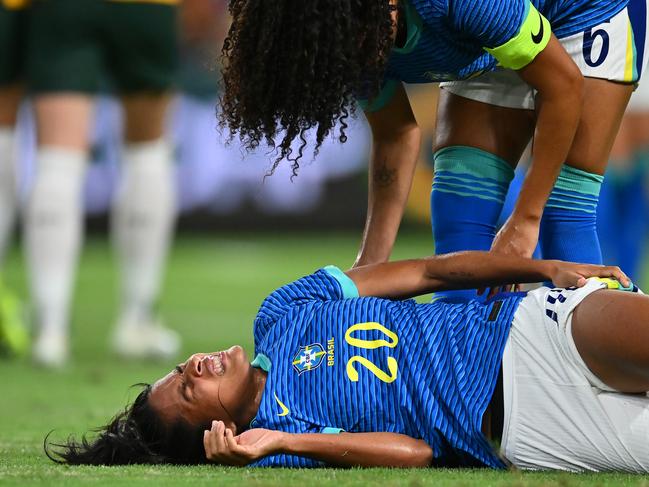 Brazil’s Marília da Cruz Furiel goes down, one of several stoppages throughout a long clash at Suncorp Stadium. Picture: Getty Images