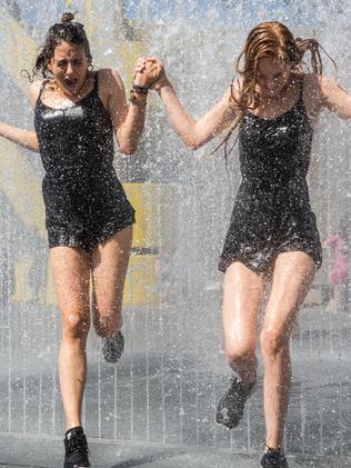 LONDON, ENGLAND - JUNE 30: People cool off in a fountain outside the Southbank Centre on June 30, 2015 in London, England. The UK is currently experiencing a heatwave, with temperatures of 35 degree celsius forecast tomorrow in some parts of the country. The extreme heat has already seen train cancellations and a health warning has been issued. (Photo by Rob Stothard/Getty Images)