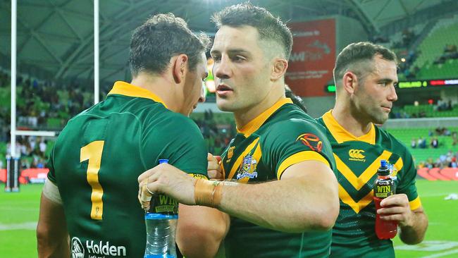 Billy Slater, Cooper Cronk and Cameron Smith celebrate Australia’s win. Picture: Mark Stewart