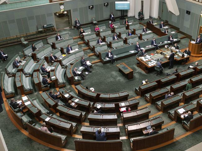 A reduced number of politicians in the House of Representatives during Question Time at Parliament House in Canberra. Picture: Gary Ramage