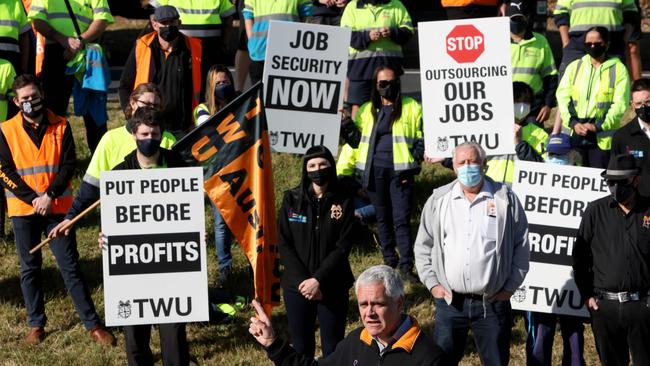 TWU national secretary Michael Kaine with transport workers on strike outside Startrack in Minchinbury. Picture: NCA NewsWire/Damian Shaw