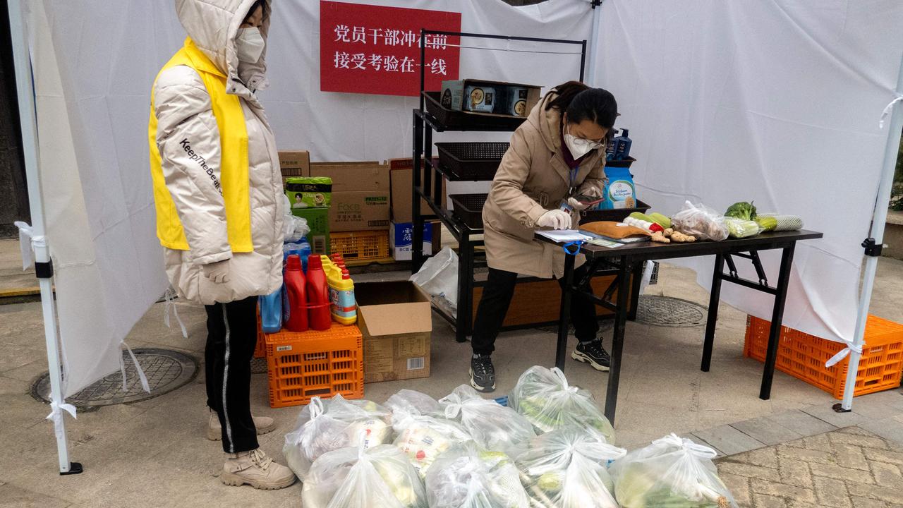 A temporary stall set up for residents to buy food and daily necessities in a residential compound in Xi'an. Picture: AFP