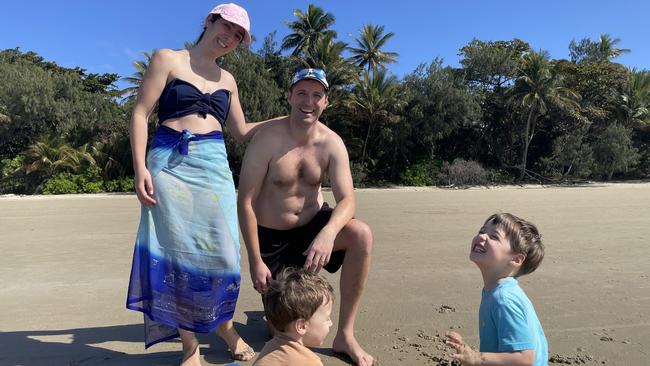 Adelaide family Anna and Michael Wilczyski and sons Leo and Eli enjoying the sand at a busy Four Mile Beach in Port Douglas. Photo: Mark Murray.