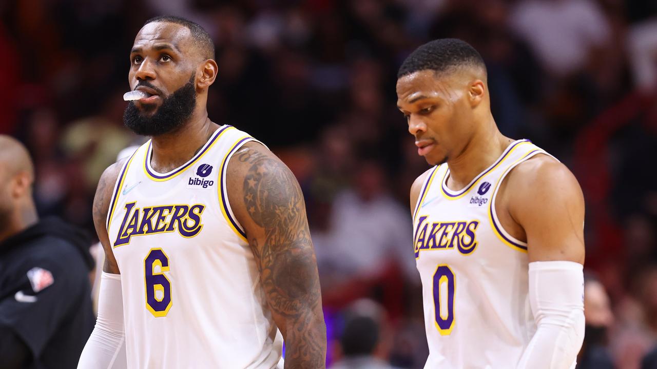 MIAMI, FLORIDA - JANUARY 23: LeBron James #6 and Russell Westbrook #0 of the Los Angeles Lakers react against the Miami Heat during the first half at FTX Arena on January 23, 2022 in Miami, Florida. NOTE TO USER: User expressly acknowledges and agrees that, by downloading and or using this photograph, User is consenting to the terms and conditions of the Getty Images License Agreement. (Photo by Michael Reaves/Getty Images)